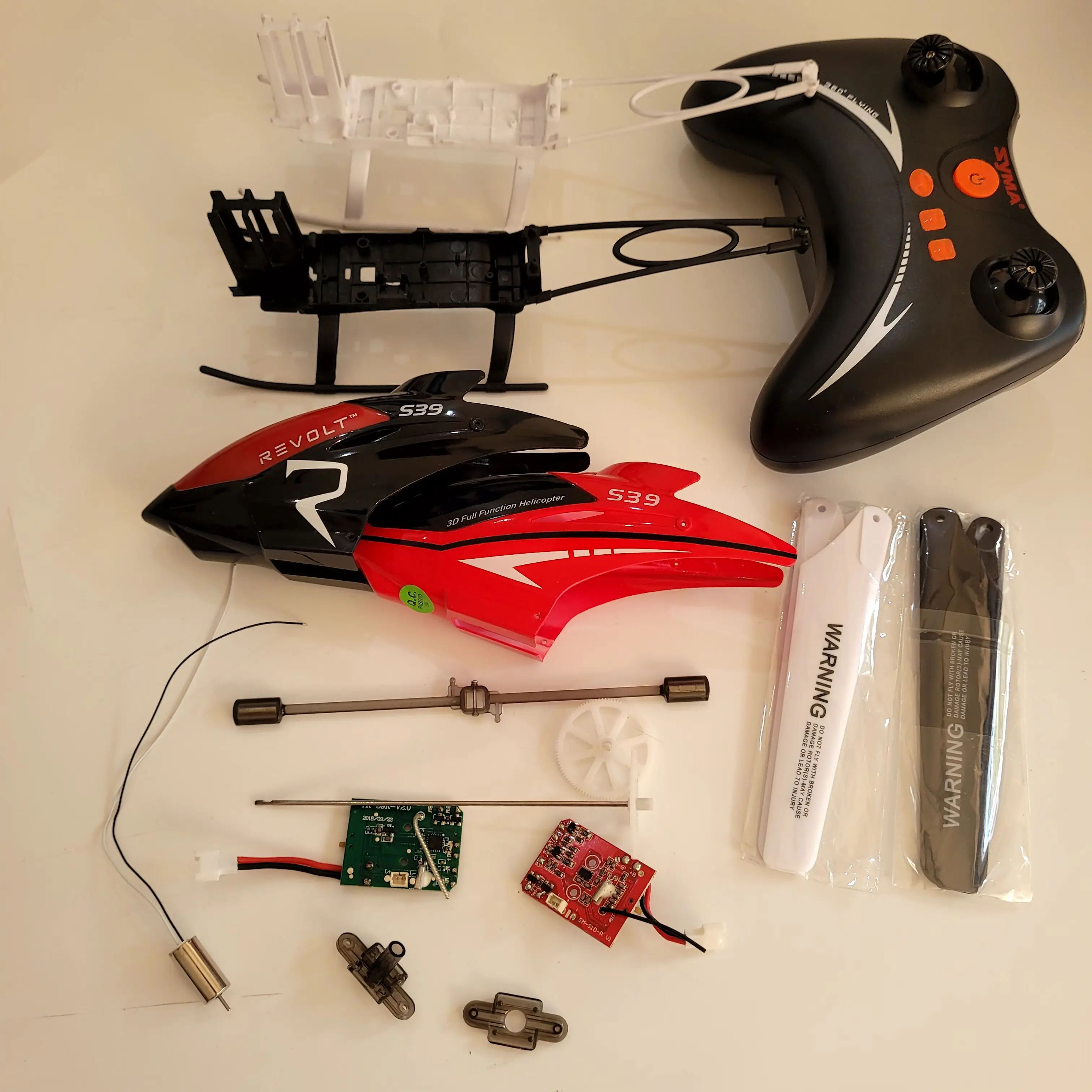 Оригинальная запасная часть для вертолета SYMA S39, главная балда/двигатель/редуктор/контроллер/крышка головки/балансир/посадочная платформа и т. д. Оригинальная запасная часть для вертолета SYMA S39, главная балда/двигатель/редуктор/контроллер/крышка головки/балансир/посадочная платформа и т. д.