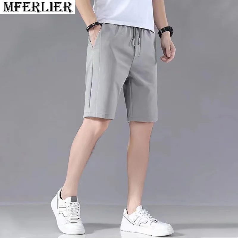 Pantalones cortos deportivos de verano para hombre, shorts de playa de secado rápido, elásticos finos verdes, sueltos, sencillos, para hacer ejercicio, para gimnasio, 5XL