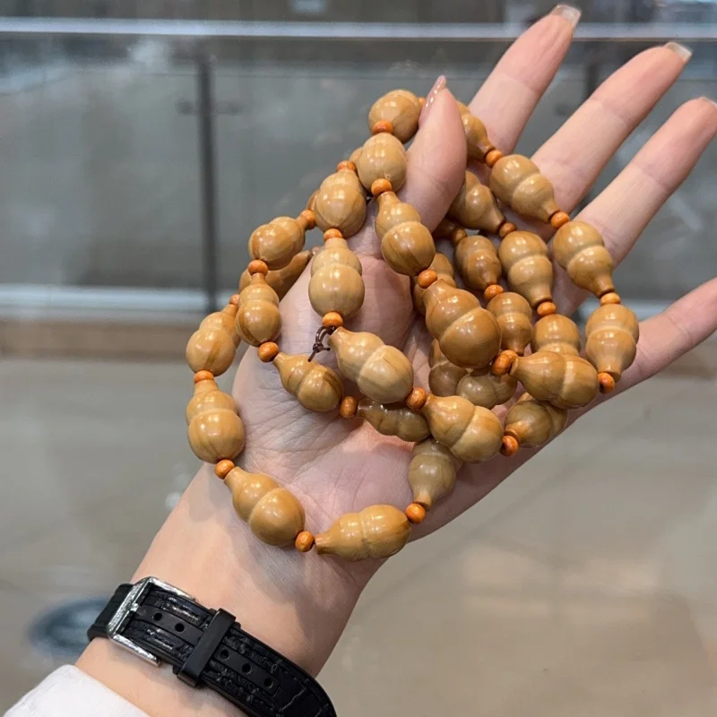 Nueva pulsera de calabaza con diseño de hueso de oliva, un accesorio moderno y versátil