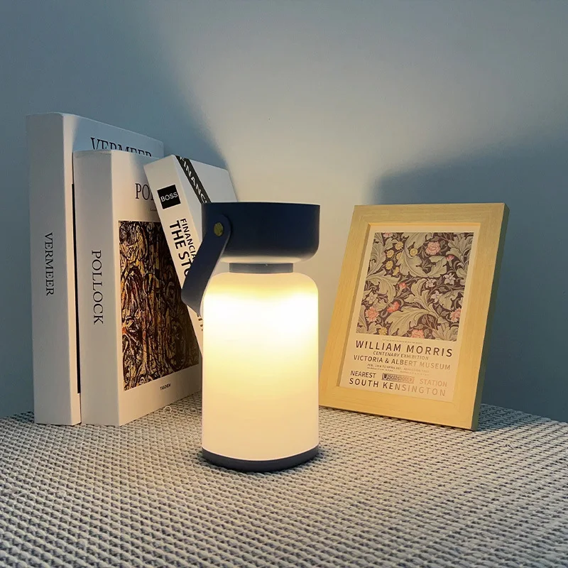 

Hot selling portable outdoor camping creative bedroom minimalist handheld light charging night light dormitory lighting