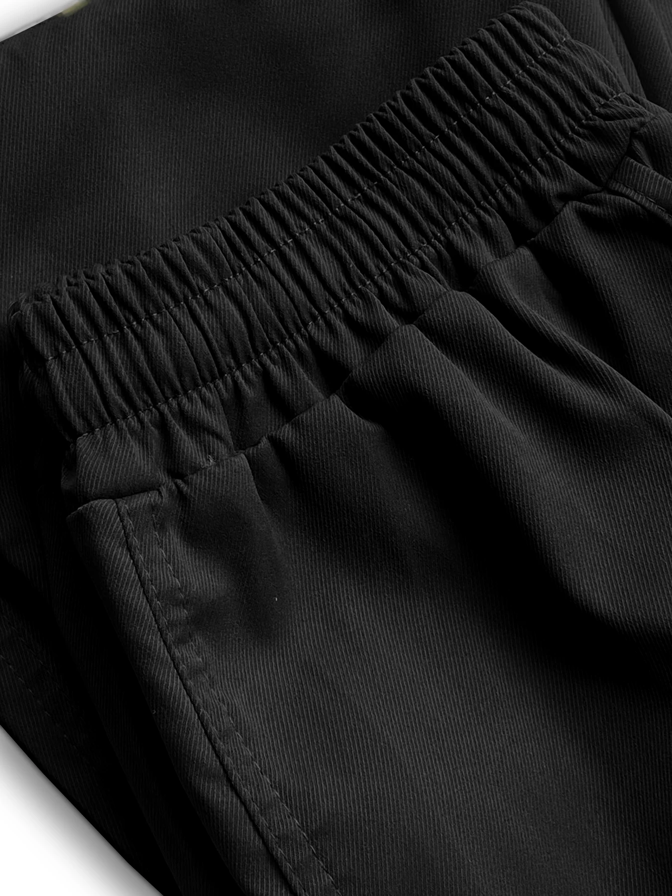Pantaloni sportivi casual abbinati ai colori alla moda casual da uomo Tasca in tessuto con cuciture Piedi Pantaloni casual Tasca cargo Tuta ampia