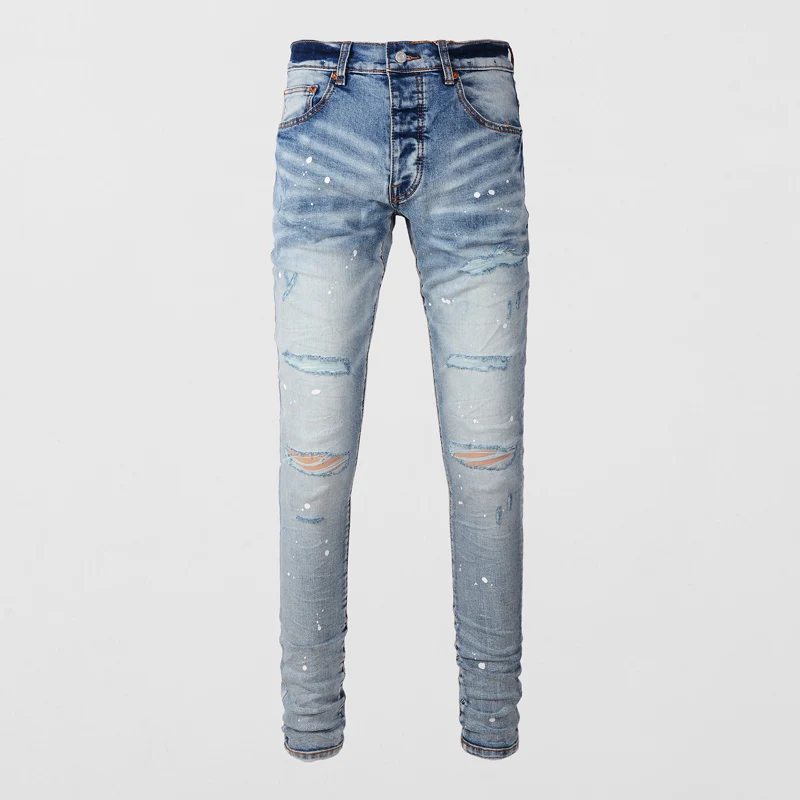 

Fashionable new denim jeans washed with nostalgic distressed patches washed with water blue painted denim jeans high street desi