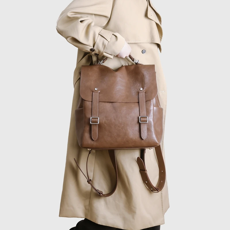 2025 new fashion female luxury designer handbag wax leather buckle bottom shoulder bag pu leather soft commuter armpit handbag