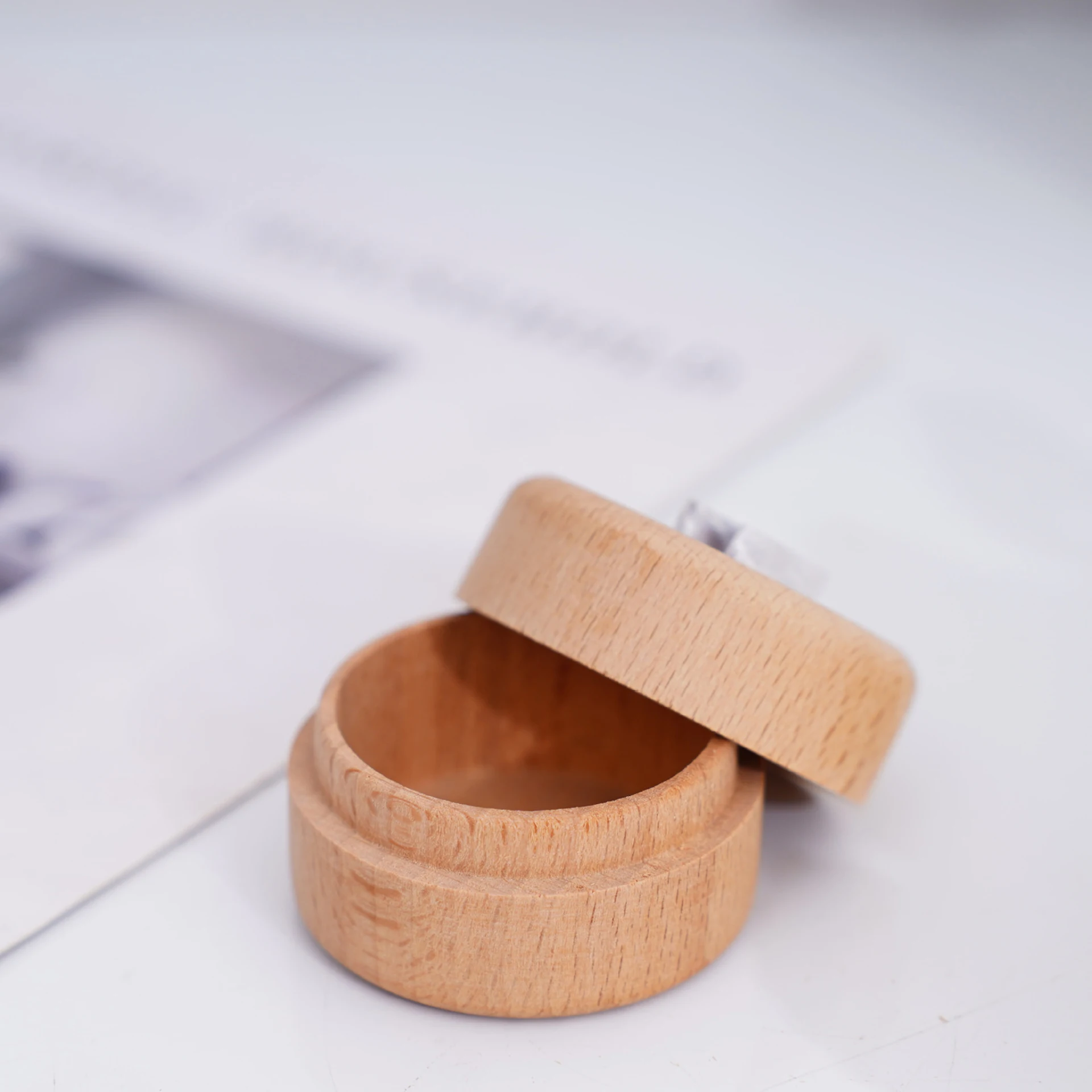 Simple circular solid wood baby teeth storage box with engraved words to commemorate baby teeth, fetal hair, and precious storag