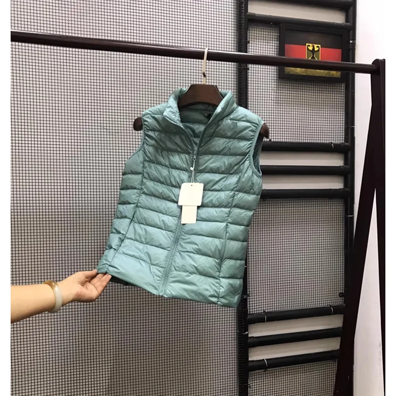 Vrouwen Slanke Mouwloze Rits Donsjacks 2023 Herfst Winter Warme Vrouwen Vesten Draagbare Ultralight Witte Eendendons Vest