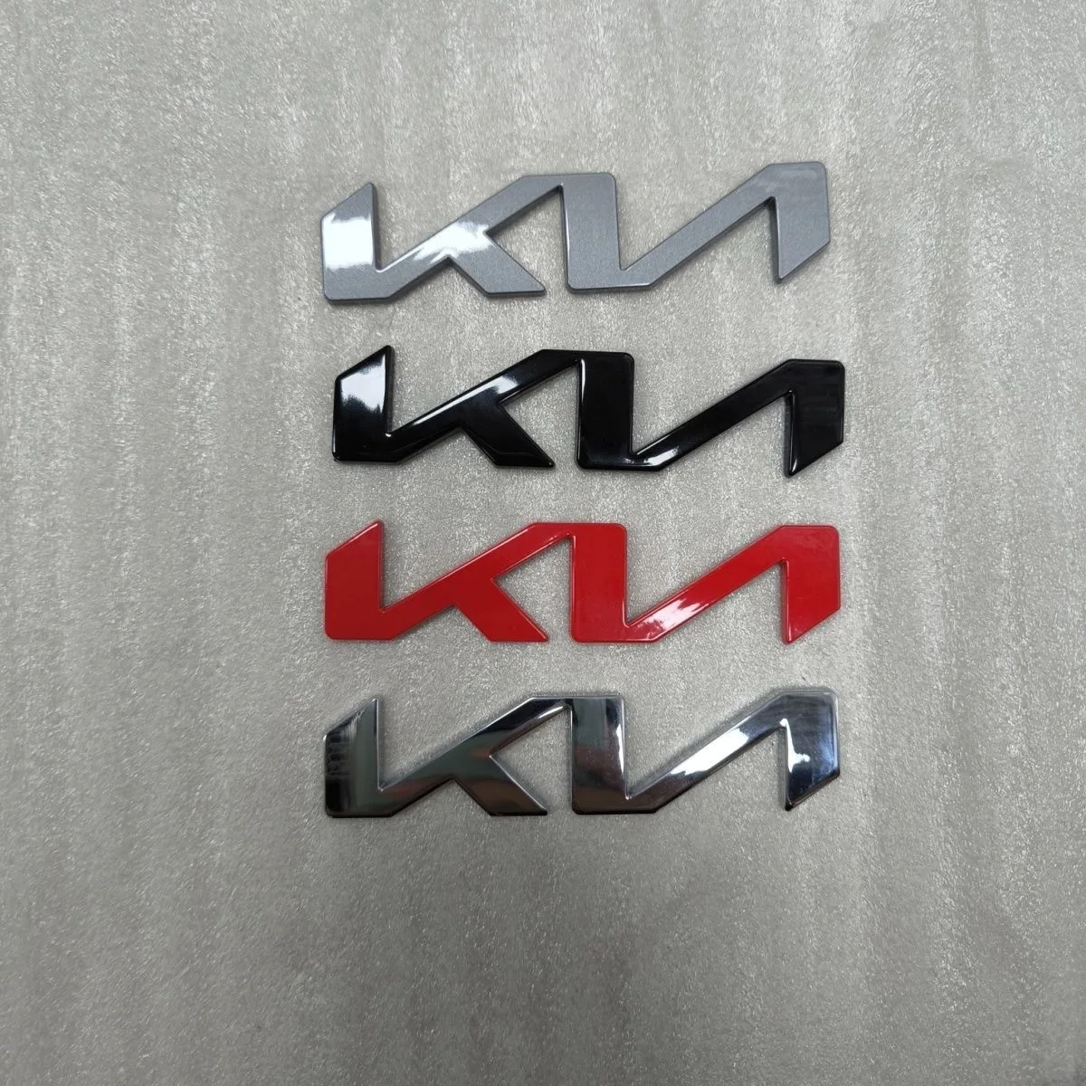 Autocollant de logo avant de voiture KN ABS, autocollant de pare-chocs arrière, emblème de porte arrière, accessoires de style pour nouvelle Kia, 1PC