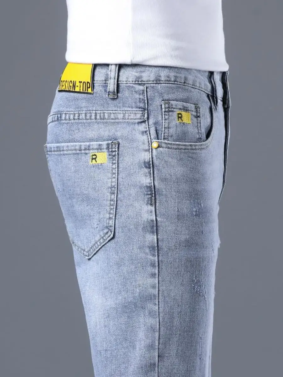 

Spring 2026 Men's Light Blue Elastic Slim Fit Jeans Trendy Korean Sle Youthful Long Pants Casual Bright Tead Waed