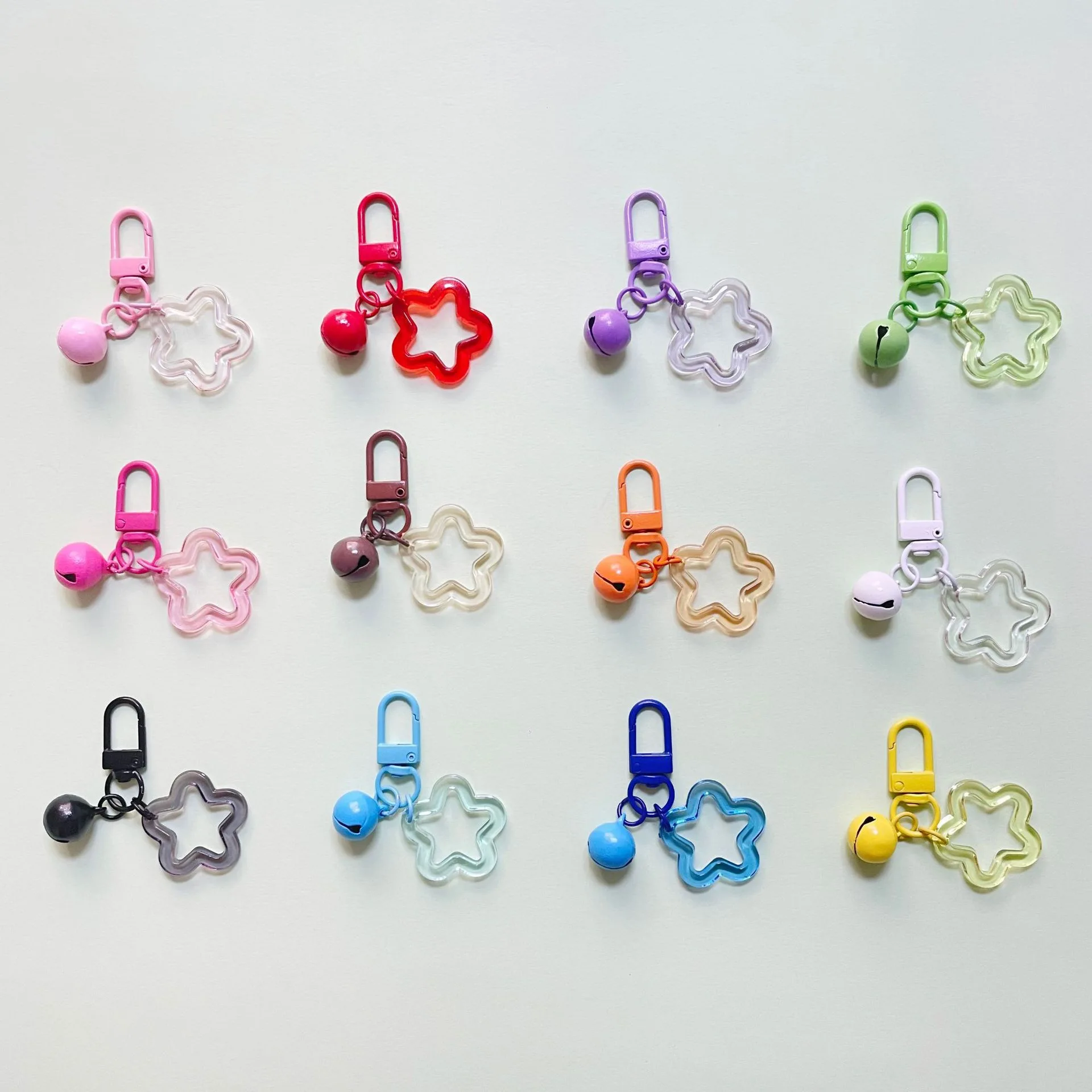 30pcs/lot candy-colored hollow transparent five-pointed star bell keychain cute handmade diy small pendant accessories