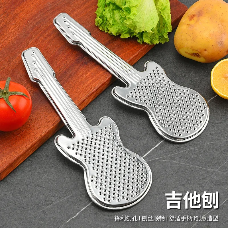 Raspador con forma de guitarra de acero inoxidable, pelador de patatas doméstico creativo, herramienta pequeña de cocina