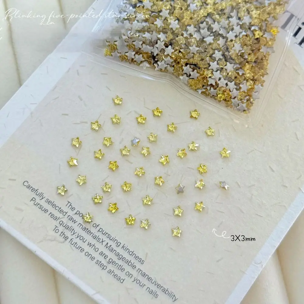 50 SZTUK Kryształków do zdobienia paznokci 3D, błyszczące, kolorowe, z ostrym dnem, lśniące cyrkonie, błyszczące brokatowe mini gwiazdki 3 mm