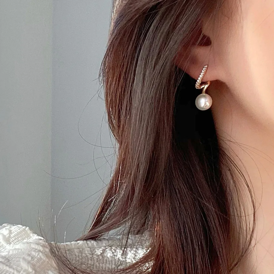 Pendientes de gota de perlas con diamantes de imitación para mujer, aretes giratorios geométricos irregulares de Color dorado para fiesta, joyería