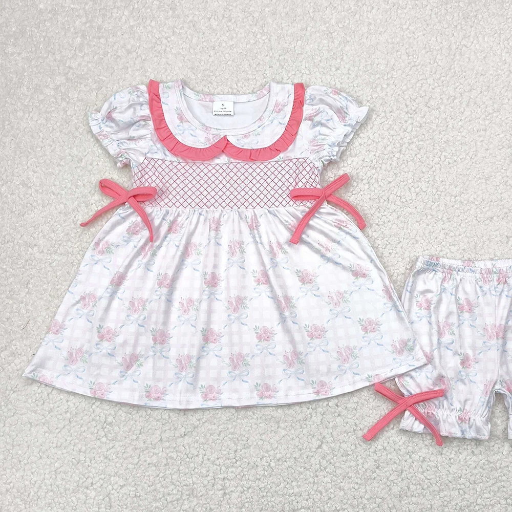 طقم شورت مكشكش بأقواس زهور وردية للفتيات الصغيرات بأكمام قصيرة مع فيونكة منقوشة للفتيات الصغيرات