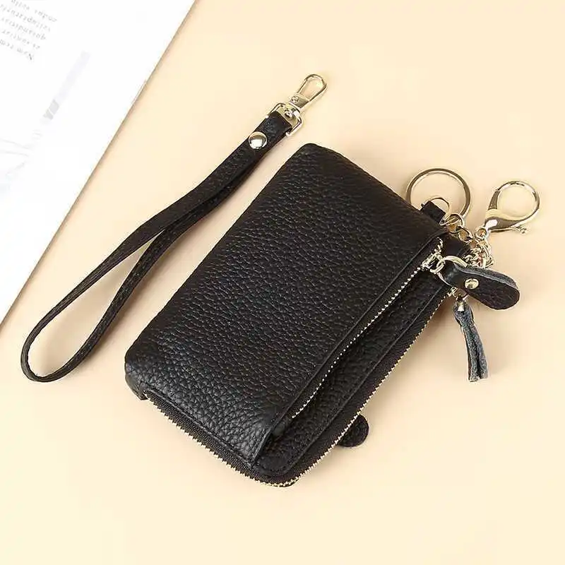กระเป๋าสตางค์อเนกประสงค์เป็นศูนย์ หนังระดับไฮเอนด์ รุ่นใหม่ปี 2025 สายมือถือเรียบง่ายของผู้หญิง กระเป๋าสตางค์ใบสั้น กระเป๋าใส่บัตร กระเป๋าใส่เหรียญ