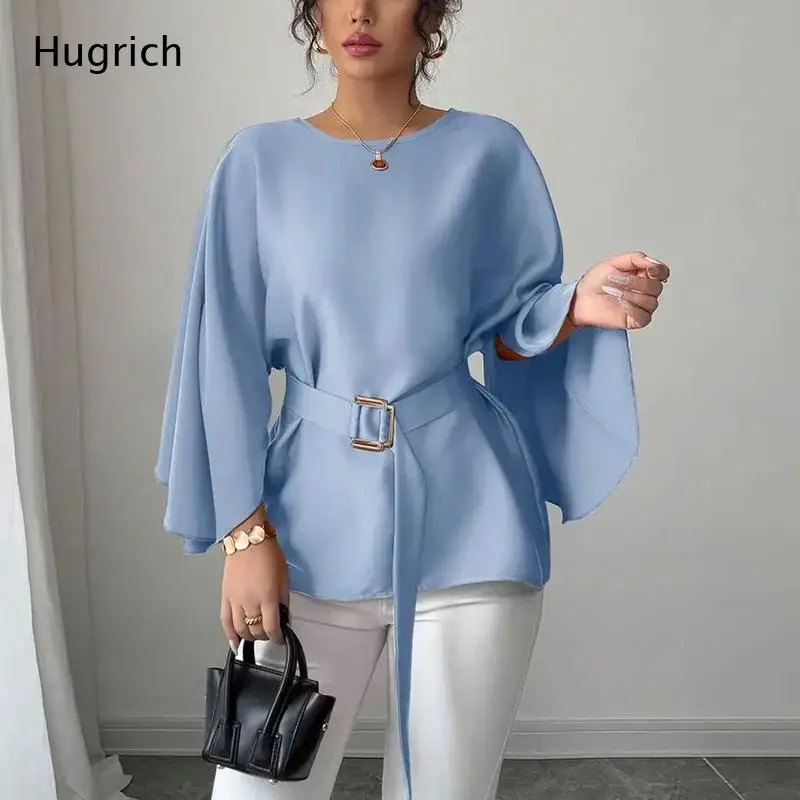 

Light Blue Blouse with Batwing Sleeves Round Neck and Matching Belt with Gold Buckle Cinched Waist Casual Top