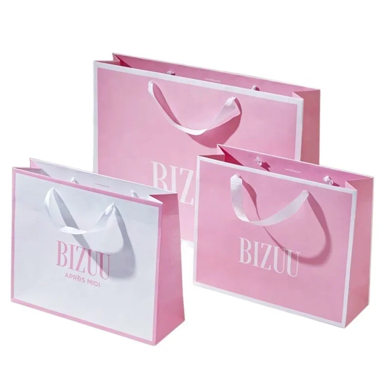 Bolsas personalizadas con impresión de logotipo, bolsa de papel de joyería de lujo, bolsas de papel de tienda de moda rosa fuerte de lujo por iDreamPackaging