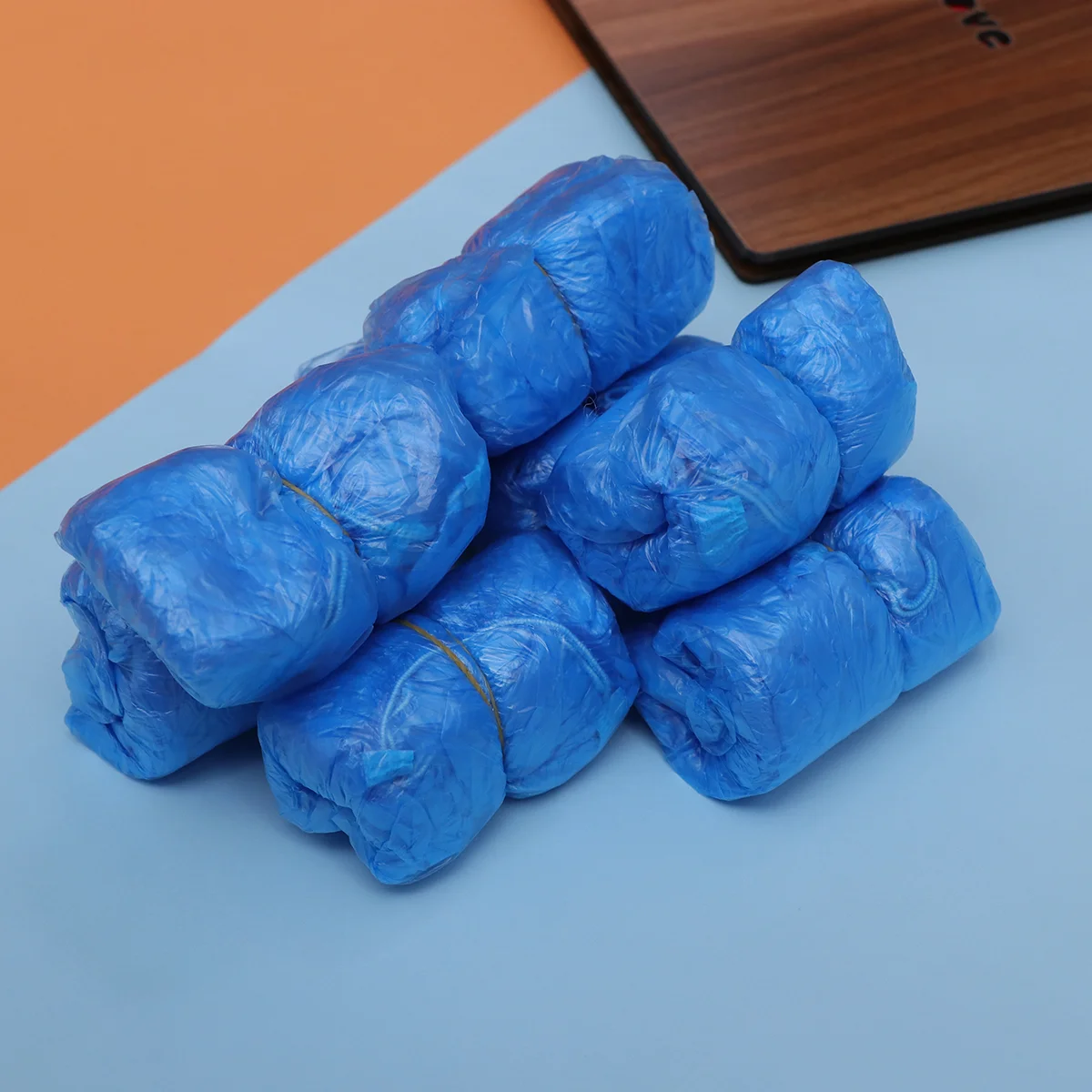 100 buah sepatu tahan air untuk wanita penutup polietilen karpet Area sepeda sekali pakai