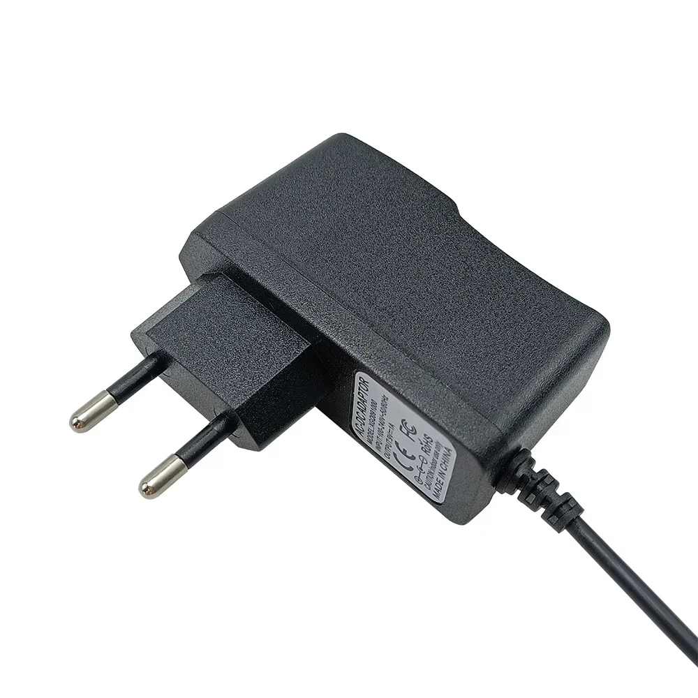 Adaptador de fuente de alimentación para Pedal de guitarra DC 9V 1A, piezas de guitarra para instrumento Musical negro AC para Pedal de efectos, enchufe europeo