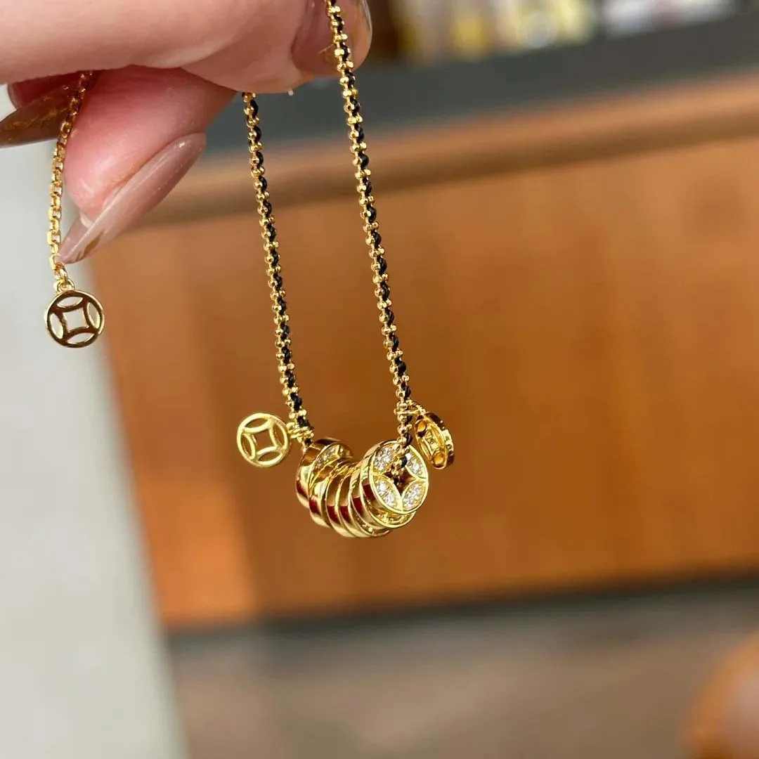 9999 gold coin bracelet with string. Elegant and luxurious style for women. Versatile and suitable for all occasions.