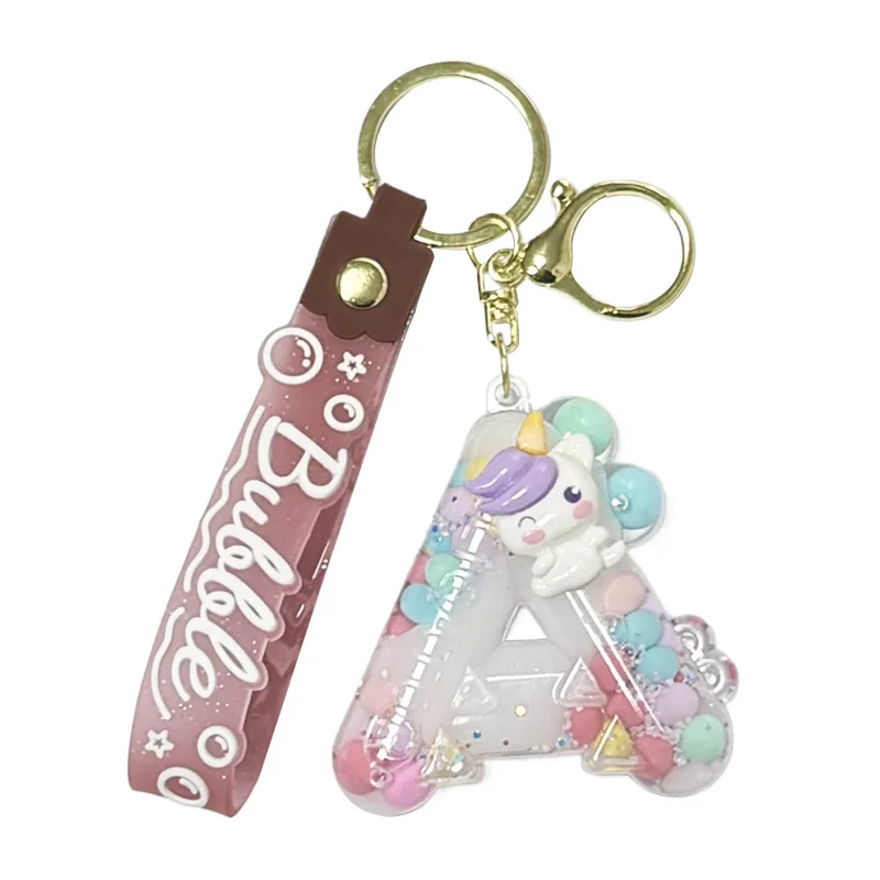 قلادة سيارة على شكل سلسلة مفاتيح مكونة من 26 حرف من مينسو، زجاجة رمل صغيرة، زينة معلقة على شكل سلسلة مفاتيح حقيبة مدرسية، هدية صغيرة رائعة