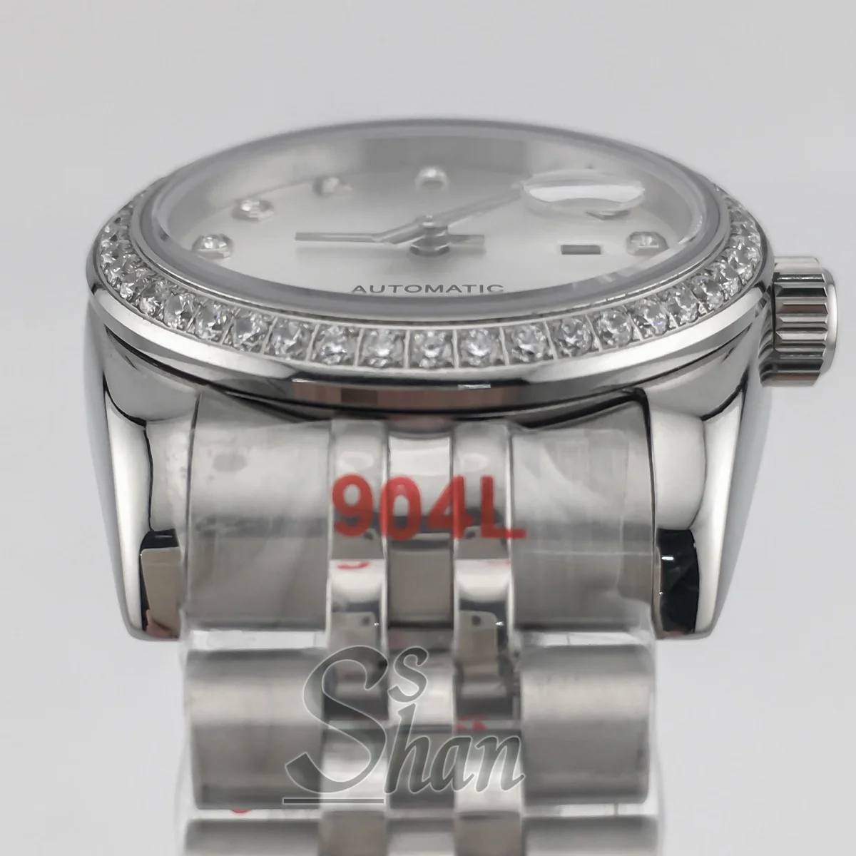 NH05 ファッショナブルな 31mm レディース自動巻き時計、ダイヤモンドベゼルとサファイアクリスタル、日光に晒されたホワイトパール文字盤、防水