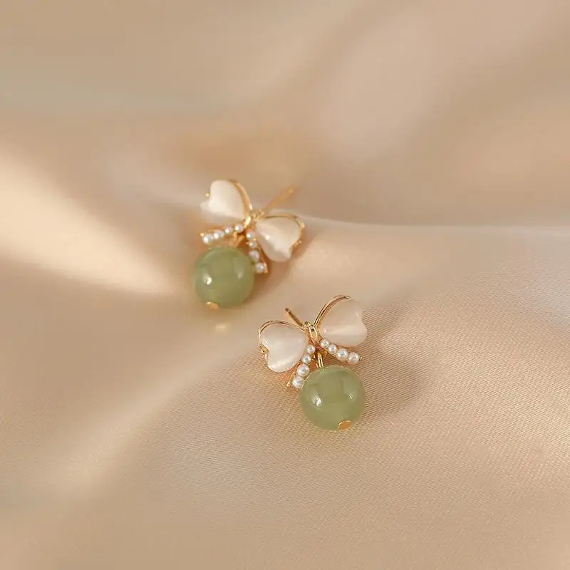 Pendientes de mujer con temperamento de Jade Hotan Natural seleccionados, joyería Retro Simple