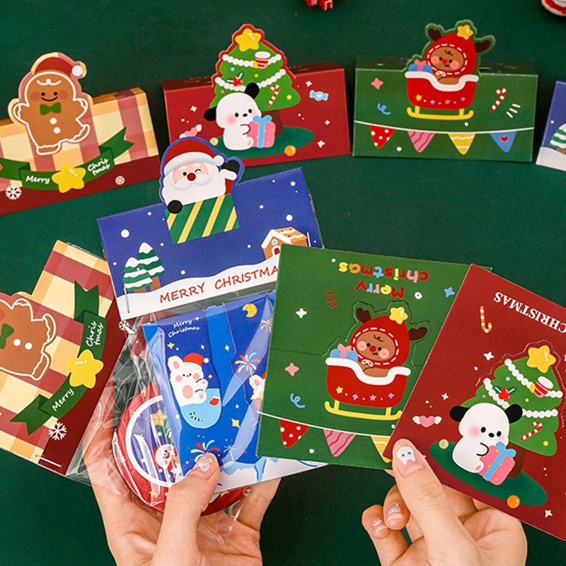 10 Uds. De cartón plegable de Navidad, bonito dibujo de Papá Noel, árbol de Navidad, hombre de jengibre, tarjeta, regalos de papel, Material de embalaje