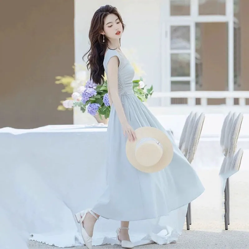 فستان بحمالات بيضاء على الطراز الفرنسي للنساء كوري أنيق برباط عالي الخصر فساتين طويلة صيفية بدون أكمام وياقة مربعة