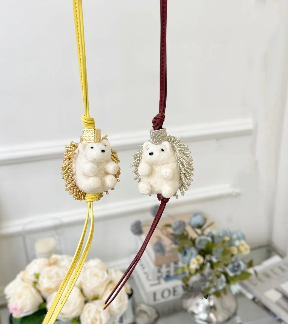 

Super cute wasteland style cartoon hedgehog bag pendant with high aesthetic value and three-dimensional car decoration keychain