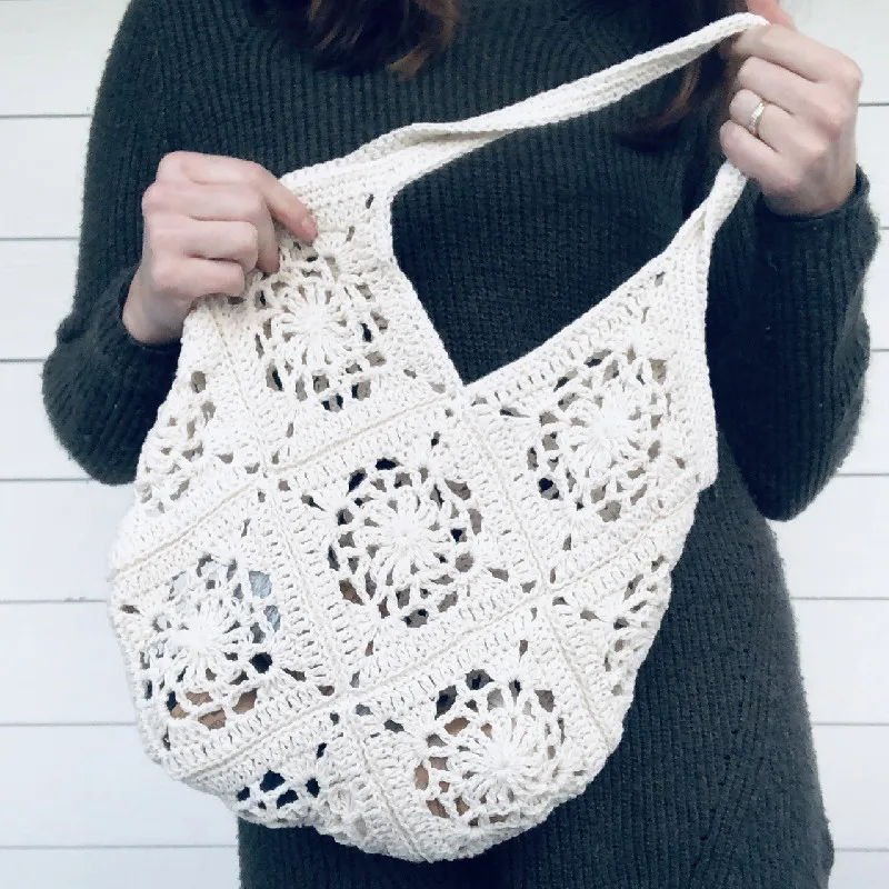 Handwoven shoulder bag with solid color hollowed out pattern handbag for women's fashionable storage bag, simple and elegant