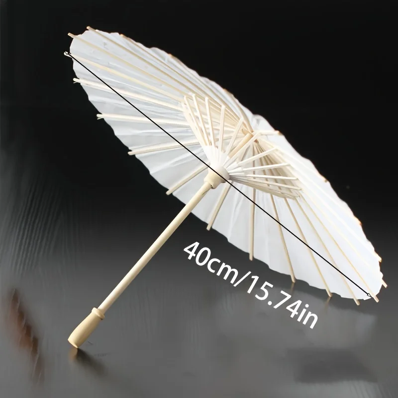 A white paper umbrella for wedding decoration - handmade traditional Chinese bridal sunshade - photo prop and party accessory
