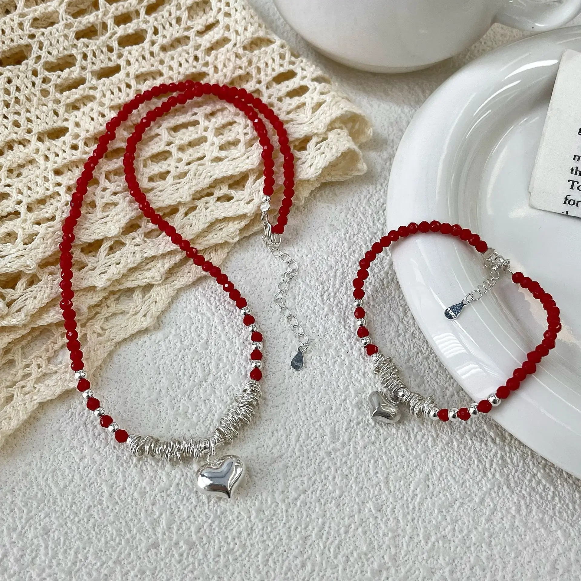 

S925 sterling silver Korean style red beaded necklace and bracelet set with heart pendant, fashionable and high-end jewelry