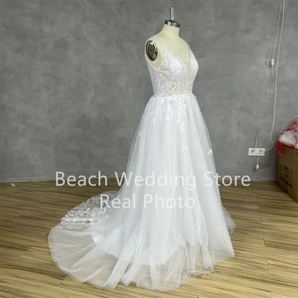 Praia personalizado cinta de espaguete profundo decote em v vestido de casamento para noiva rendas apliques brilhante tule sem costas lindos vestidos de noiva