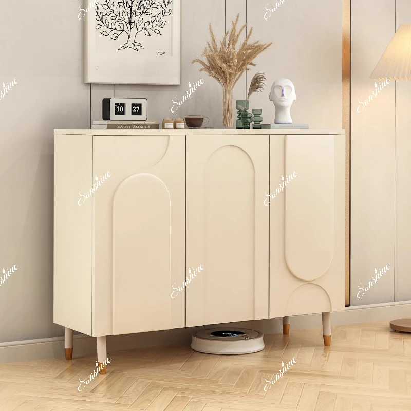 The sideboard is integrated against the wall for creamy style modern and simple solid wood living room kitchen