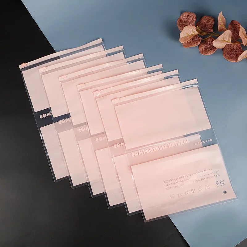 Dropshipping supported: Pink translucent PE plastic zipper bags for travel storage (clothing/underwear) — Pack of 50.