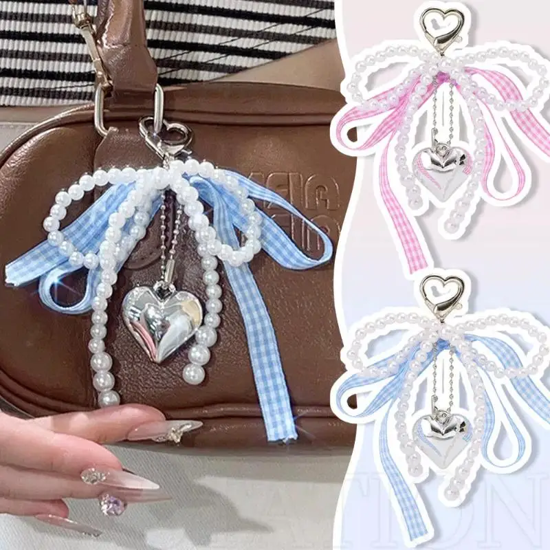 

Women Fashionable Bow Keychain Shaped Pearl Mobile Phone Charm, Bag Charm And Accessory.