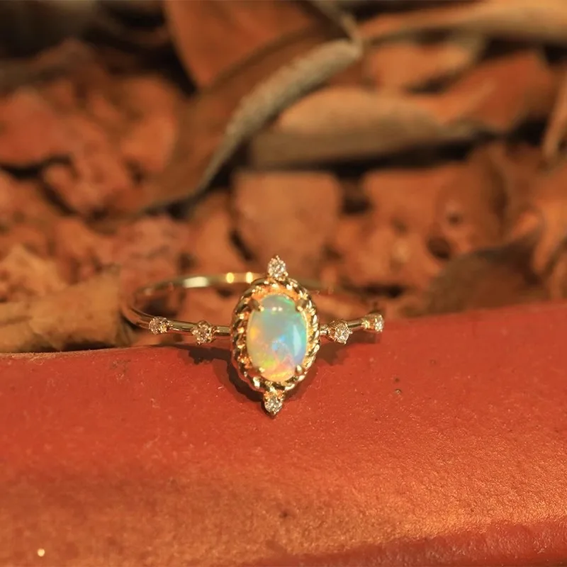 

French Medieval Geometric Oval Egg Surface Imitation Opal Ring Fashionable Retro Light Luxury Inlaid Zircon High-end Jewelry