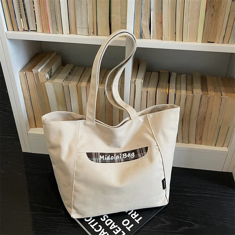 

New Fashion Large Capacity Canvas Simple Shoulder Bag Women Casual Commuting Bag Fashionable and Versatile Tote Bag Ins Style