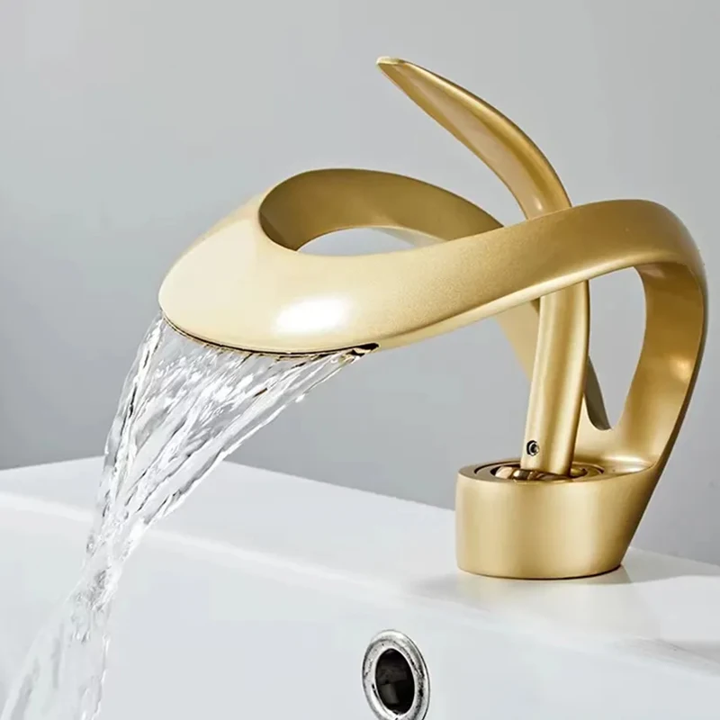 Art deck installed hot and cold faucets brass brushed gold bathroom mixer faucet waterfall basin sink faucet.