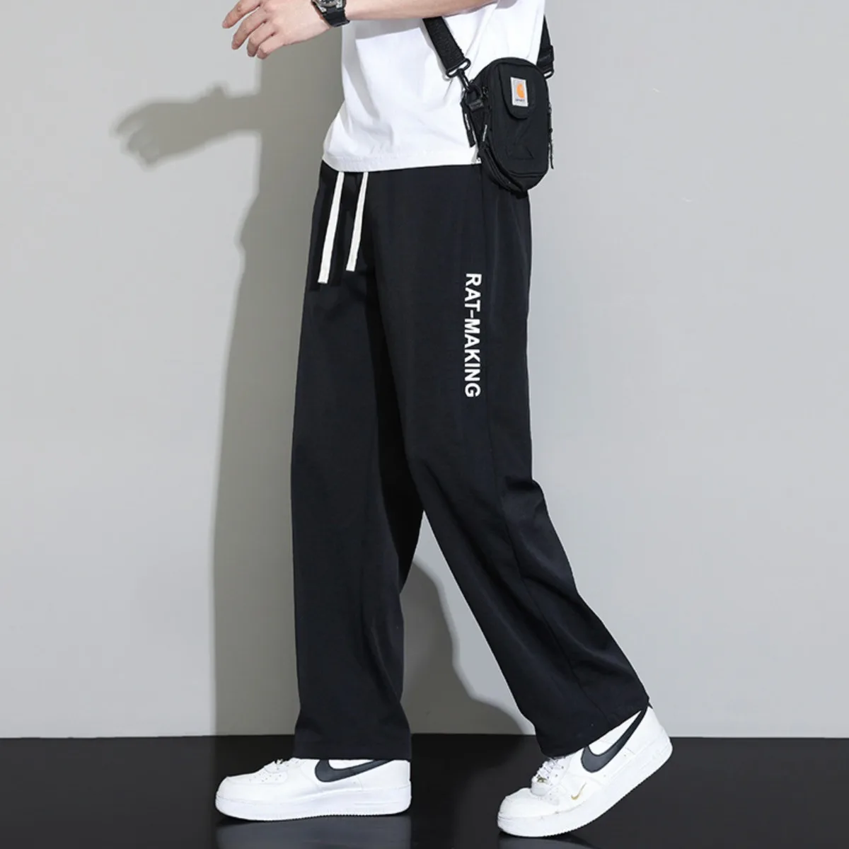 

Versatile New Men's Pants Drawstring Solid Color Casual Pants Loose Elastic Breathable Printed Letters Sweatpants Trend