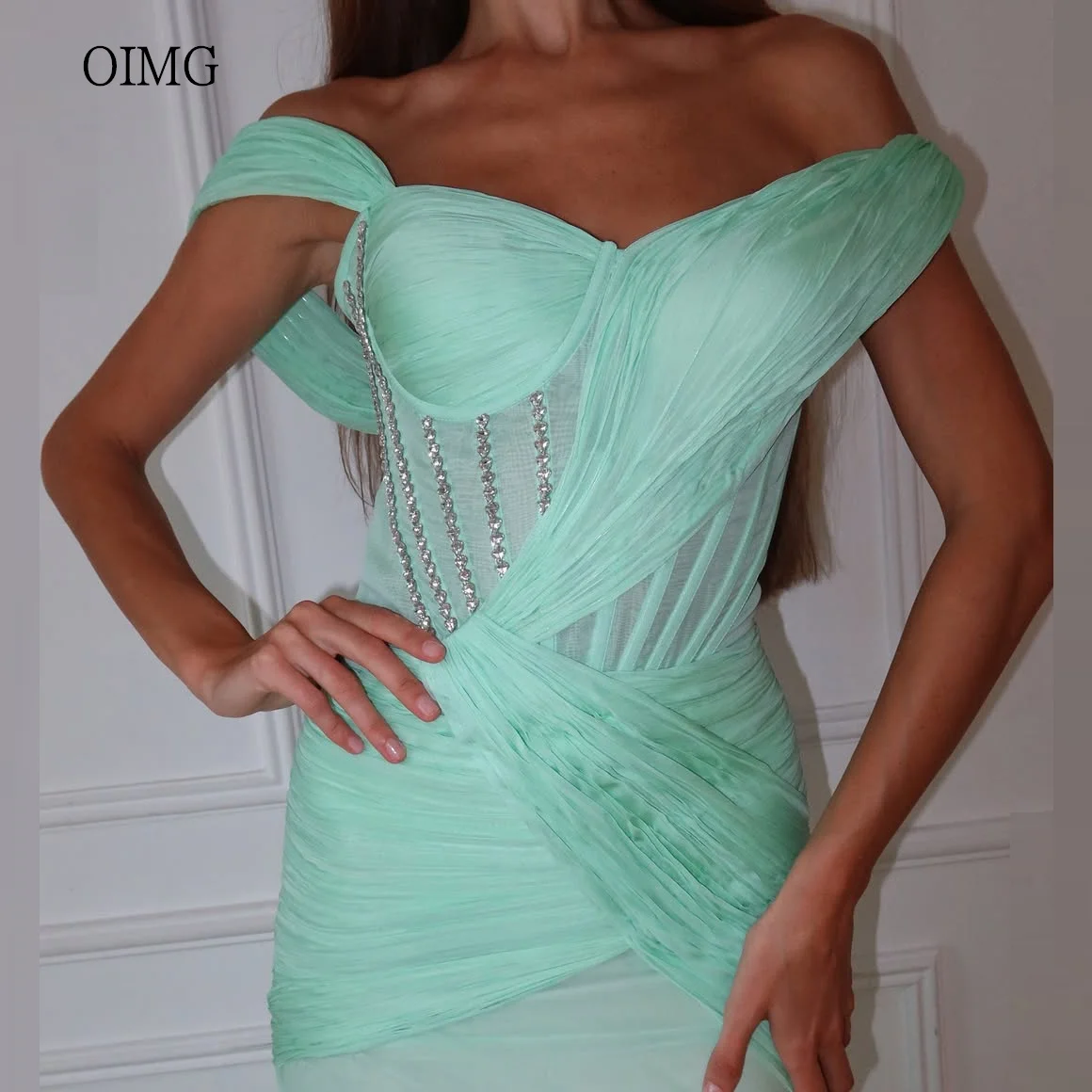 

OIMG Graceful Mint Green Mermaid Prom Gowns Off The Shoulder Beaded Party Gown Floor Length Pleated Evening Dress Customized