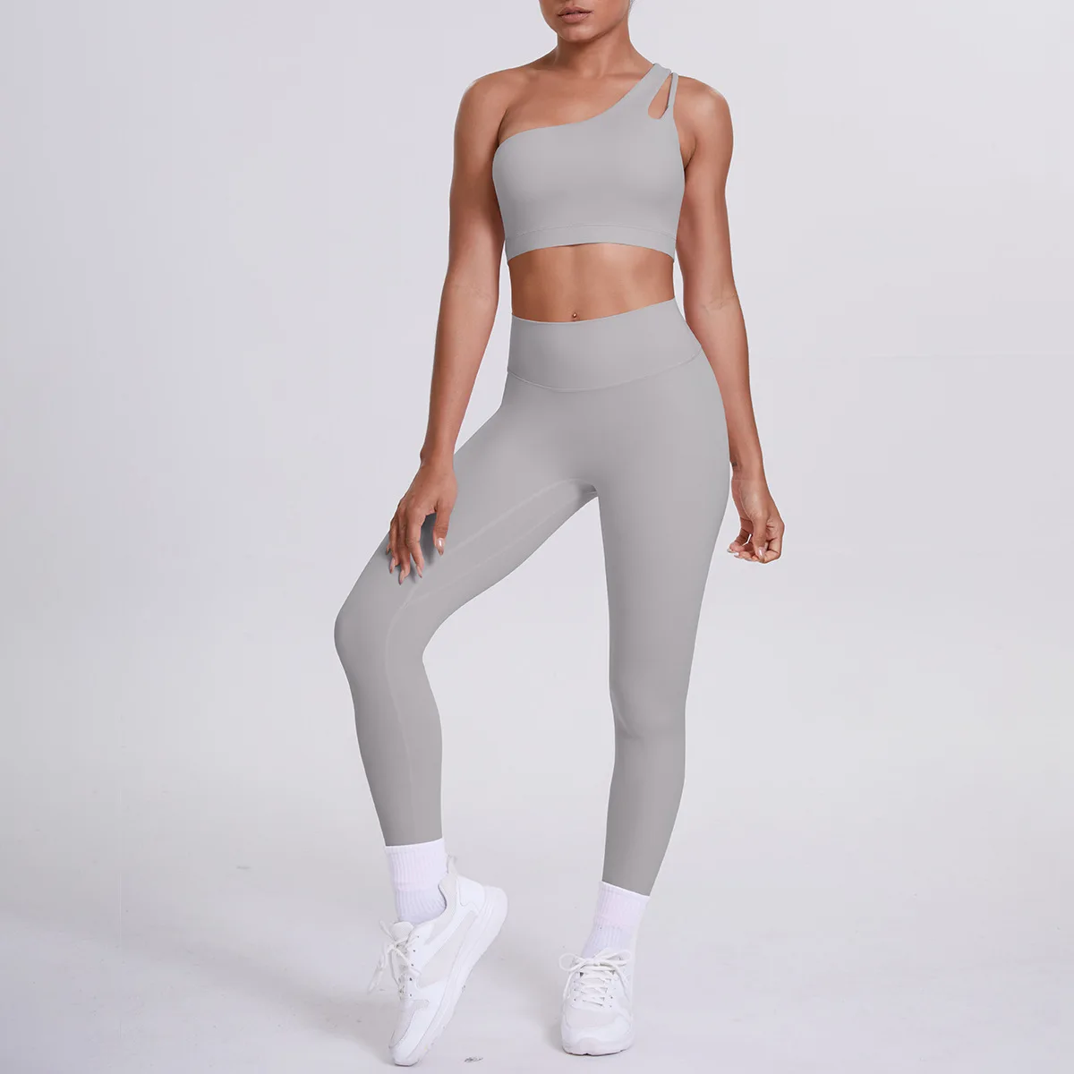 طقم يوجا مزدوج الجوانب بكتف واحد للنساء من النايلون المصقول، ملابس للتمرين في صالة الألعاب الرياضية واللياقة البدنية مكونة من قطعتين مع سراويل طويلة