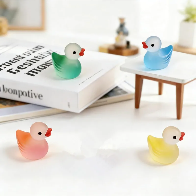 45Pcs Clear Ducks Figures Mini Resin Gradient Animals to Hide Assorted Pack of 9 Colors Glow in the Dark Tiny Ducks for Birthday