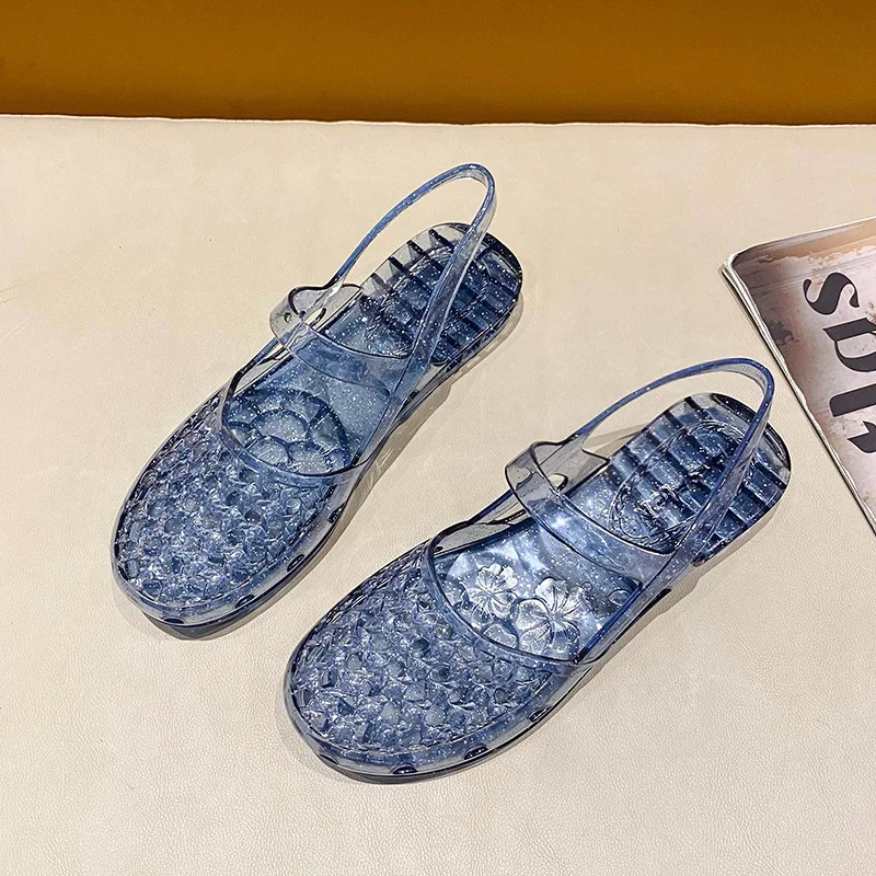 

Fashion Crystal Jelly Sandals Hollow Out Flower Embossed Sandals Women Closed Toe Ankle Strap Flat Slip On Summer Beach Shoes