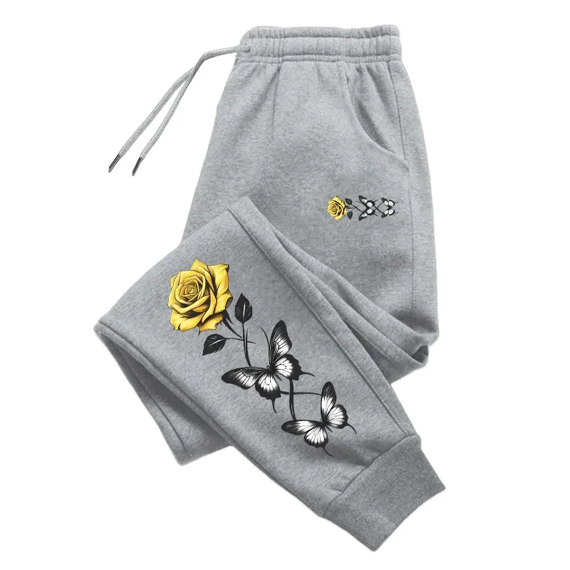 Pantalones de chándal con estampado de flores para mujer, moda urbana, pantalones holgados con cordón para correr, pantalones cómodos deportivos informales para el hogar y el exterior