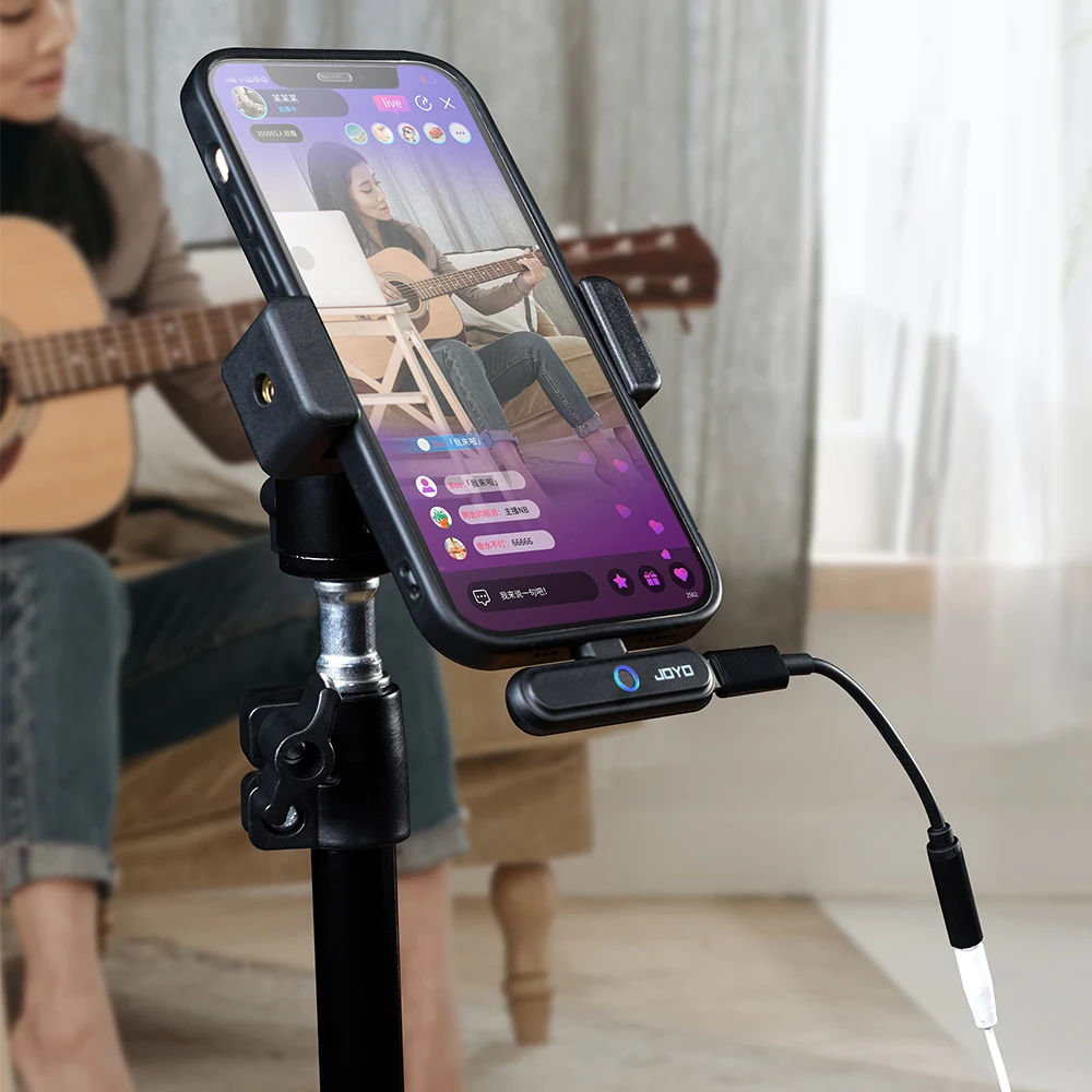 JOYO JW-05M 2.4G ميكروفون لاسلكي ذو طية صدر السترة نظام ميكروفون صغير بطارية 8 ساعات وبنك طاقة OTG للبث المباشر/تسجيل الفيديو