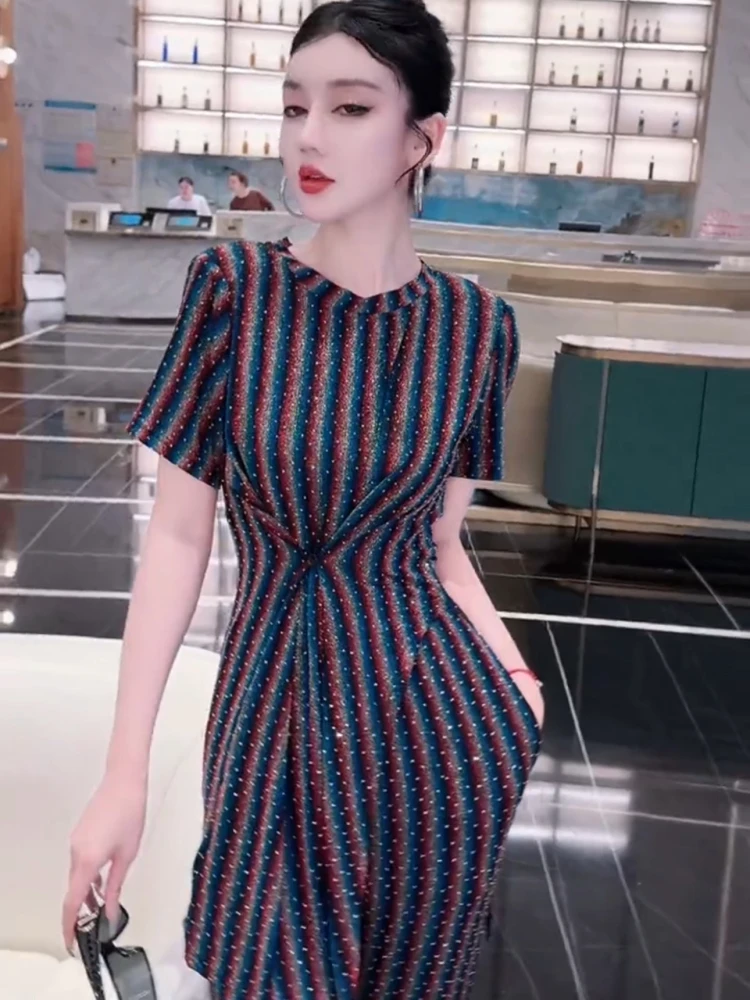 

2025 Summer New European Style Fashion Slimming and Irregular Short sleeved Top+Pants Stylish Commute Temperament Set