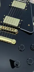 Customized electric guitar, black caston,  Imported wood,gold accessories, lightning package