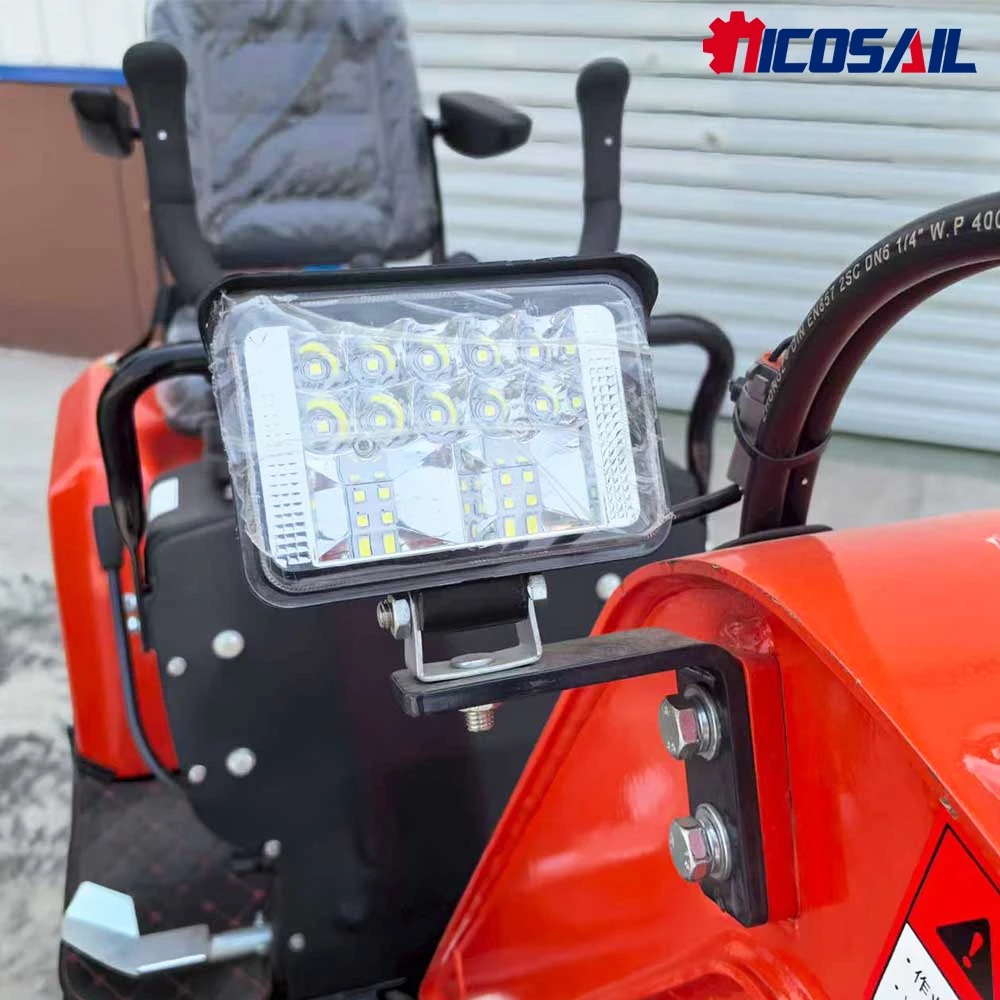 Mini koparka hydrauliczna na gąsienicach z wygodnym siedziskiem do małych prac w gospodarstwie i ogrodzie