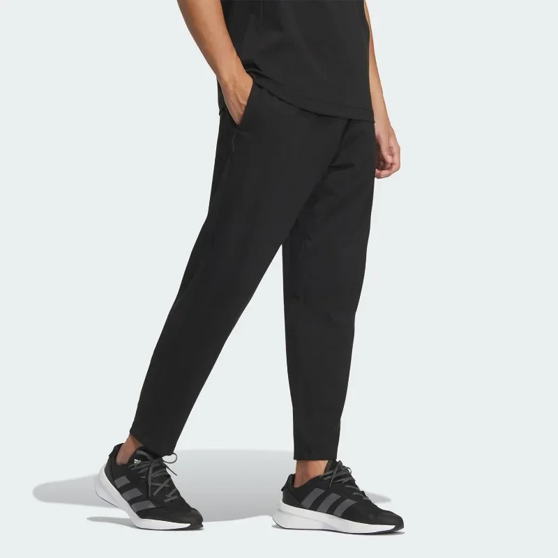 Adidas Unisex Autumn Winter for Men Women, Water Repellent Button Zip Waist Multi Cargo Pockets Travel Trousers IW1507