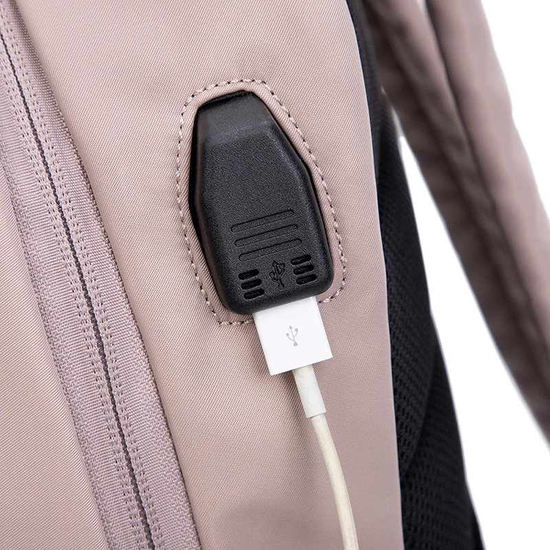 Mochila chique feminina com porta de carregamento USB Designer Laptop Bolsa de viagem antirroubo à prova d'água para viagens de negócios em estilo urbano